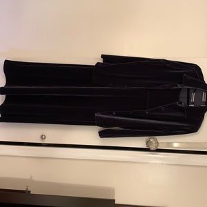 Long black velvet, sleeveless maxi dress with matching velvet jacket.